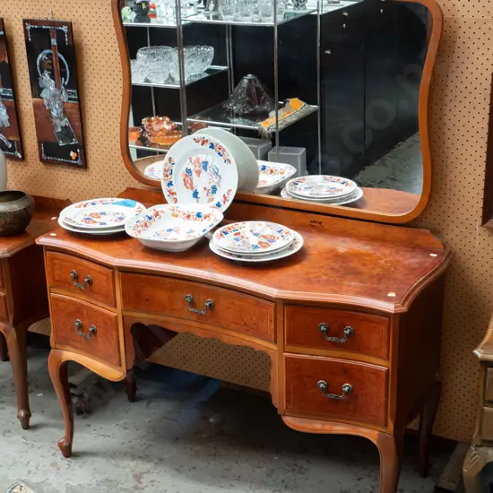 reproduction Victorian style walnut 5-drawer mirror-back kneehole dresser with cross-banded inlay drawer fronts, on