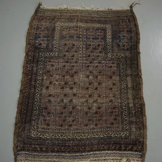 hand-knotted Persian style wool prayer rug - faded blues, reds, brown, significant wear and repairs to edging, fringe