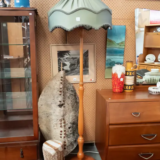 vintage rimu and beech standard lamp with fluted turned column, circular base 3 bun feet, shaped & pleated green fabric