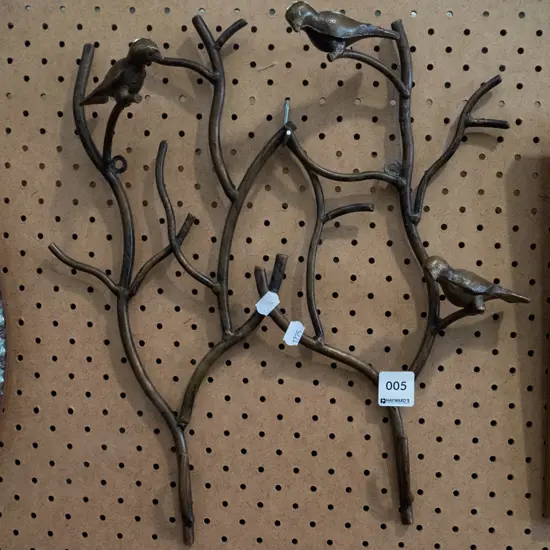 metal tree and bird themed coat hooks