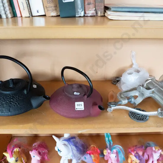 2 cast iron teapots and a benchtop mincer