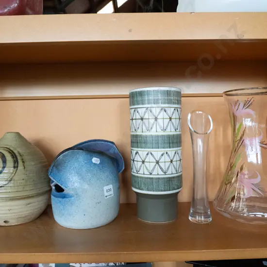 shelf of various  vases
