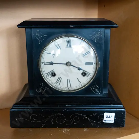 wood-cased mantel clock