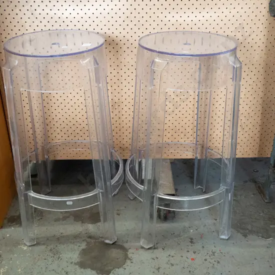2 clear perspex stools