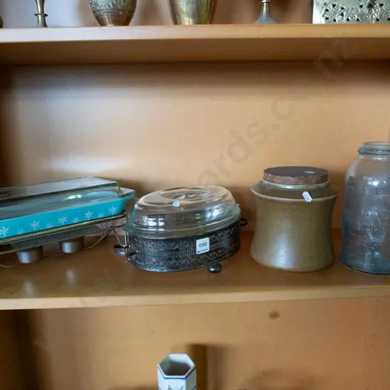 shelf of Pyrex serving dishes, Temuka pottery canister, Masons jar etc.
