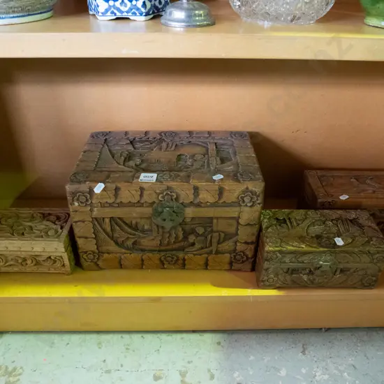 4 small carved camphorwood chests