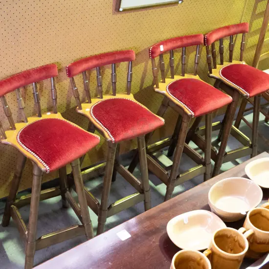 4 unusual wood, brass and red velvet spindle back bar stools