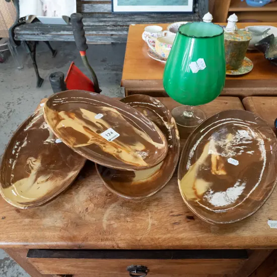 Temuka pottery Te Rona steak plates and a green glass goblet