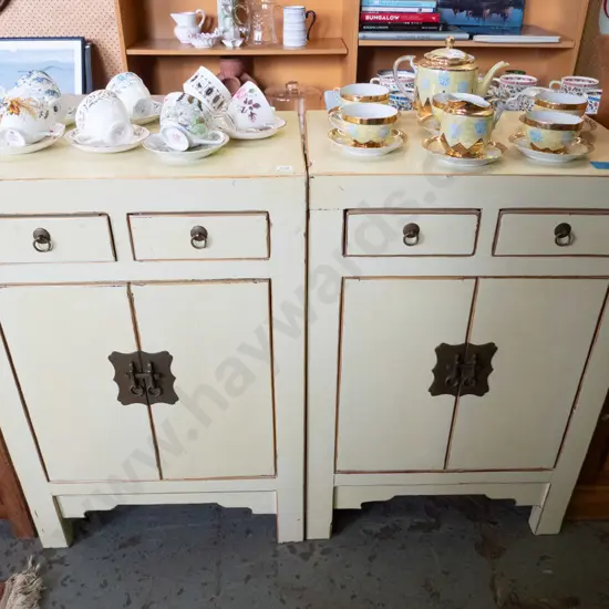 pair of asian 2-door 2-drawer cupboards