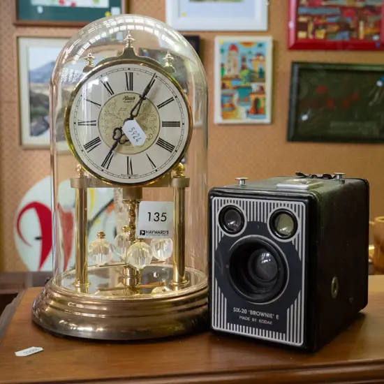 Kodak box camera and an anniversary clock