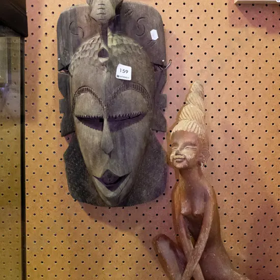 seated figurine H-380 and ethnic wall mask