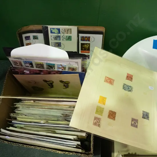 box of stamps and first day covers