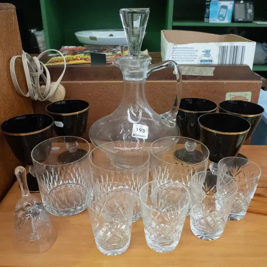 decanter, cut crystal whisky glasses, black glass goblets, etc.