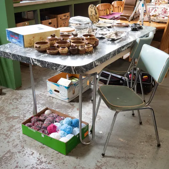 formica topped extending dining table with 2 blue vinyl and chrome chairs. Table H-770 L-1600 W-805
