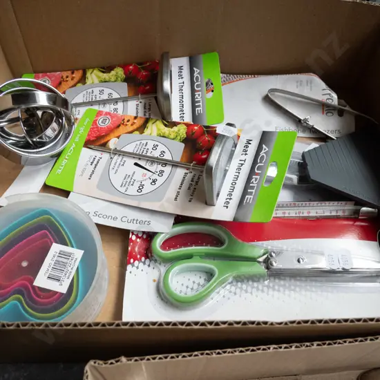 box of as-new itchen items - scone cutters, meat thermometer, herb scissors, etc.