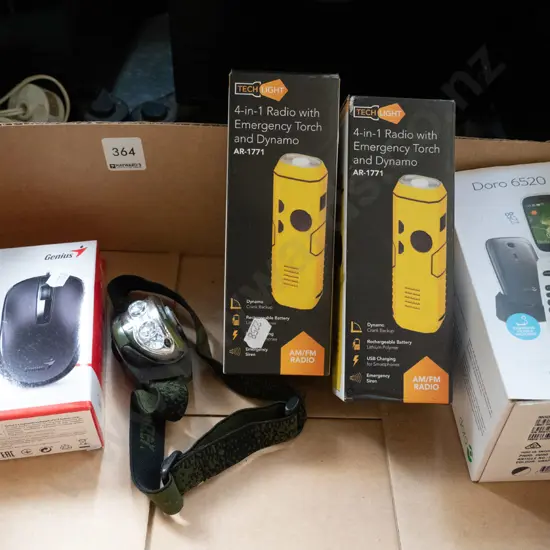 box of Dynamo torches, computer mouse, flip phone, head torch