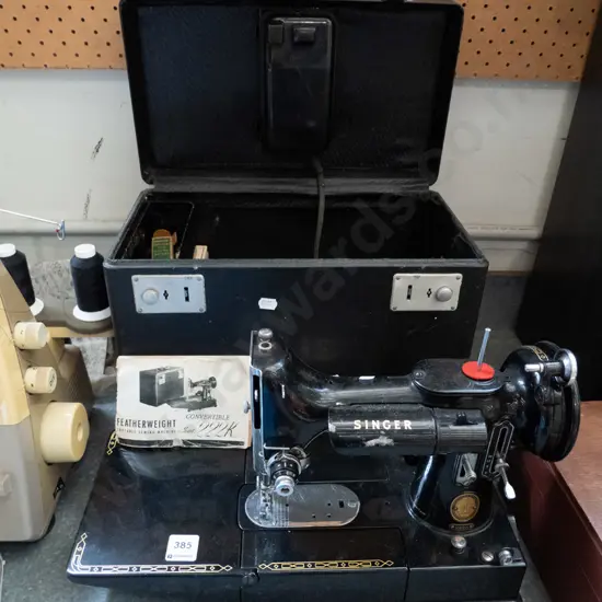 vintage Singer sewing machine and case