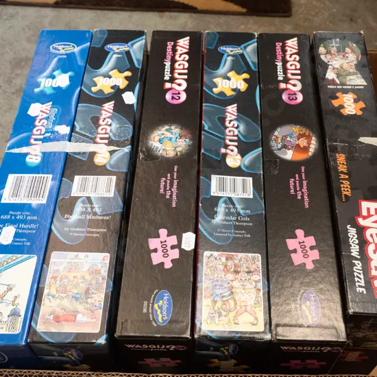 box of Wasgij puzzles