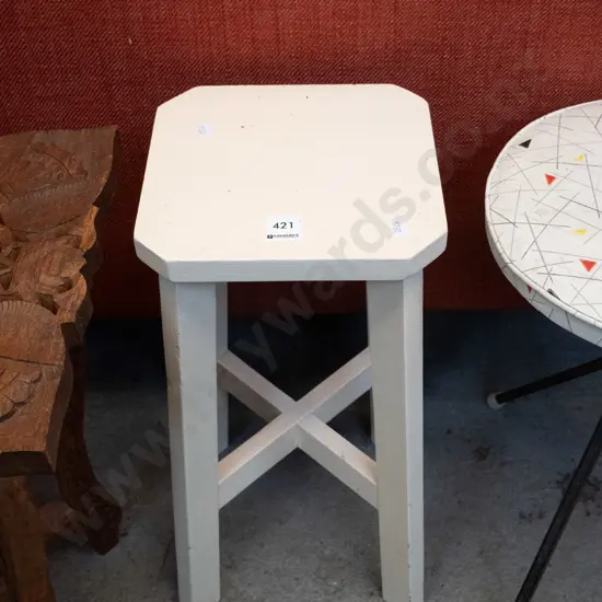 small painted wooden stool