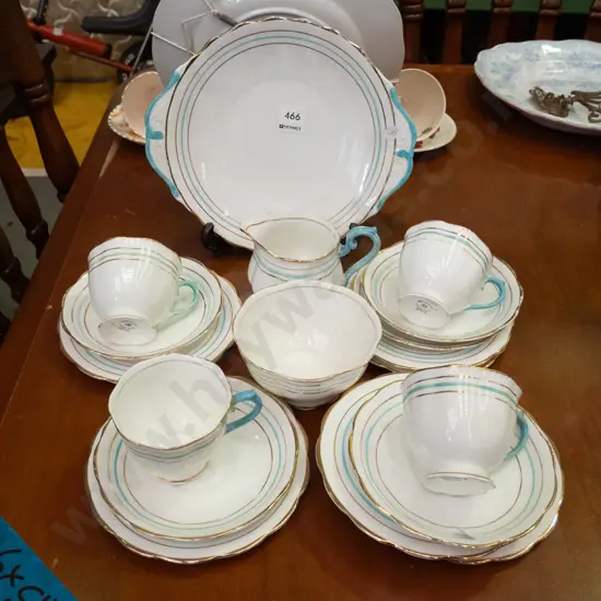 Royal Albert trios, plates, cream & sugar