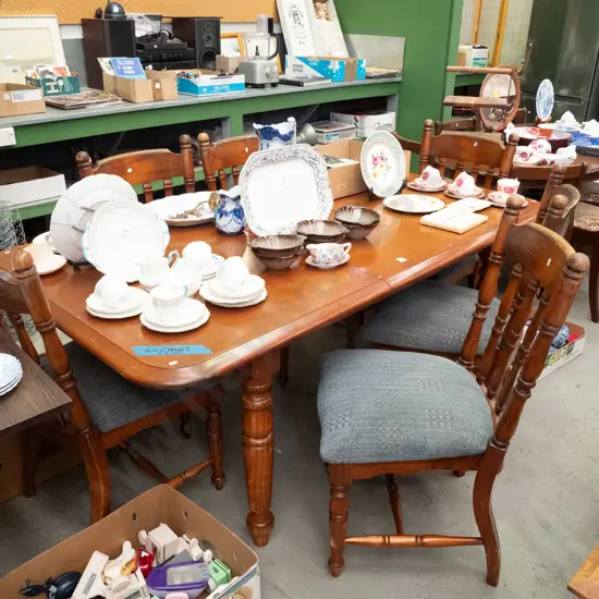 solid wood extending dining table and 6 upholstered chair, seat on one is loose, seats need a clean. H720 L1100 W820