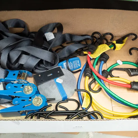 box of tie-downs and bungie cords