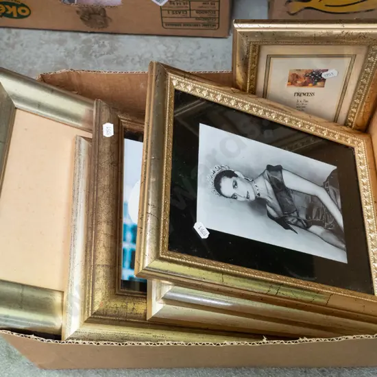 box of various photo frames