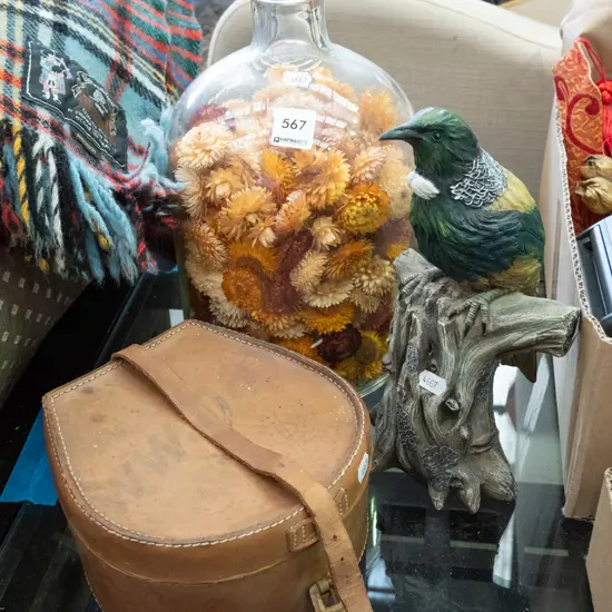 large glass vase and dried flowers, composite tui on branch, collar box
