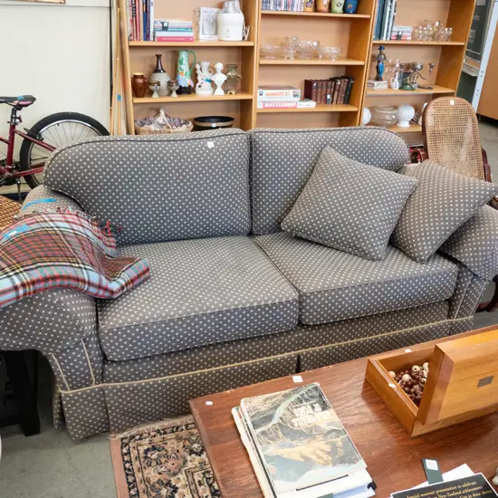 Moran patterned upholstered rolled arm 2 seater settee