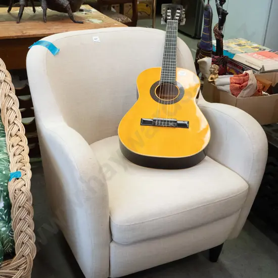 cream upholstered tub chair