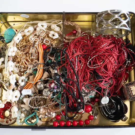 tin of costume jewellery