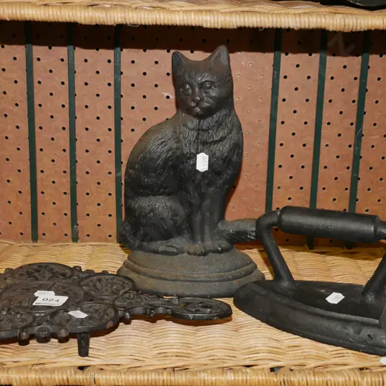 cast iron sad iron, cat themed door stop, trivet