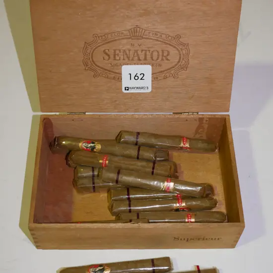 wooden box with some small cigars
