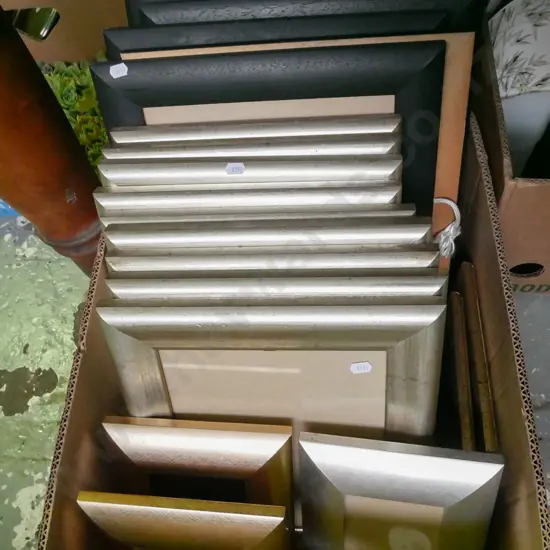 box of various photo frames