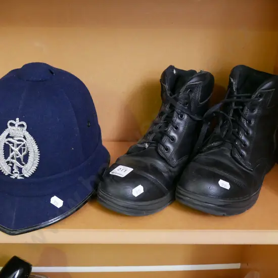 old school police helmet and boots