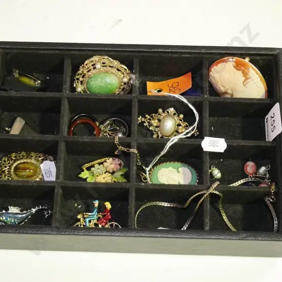 segmented box and contents; rings, pendants etc