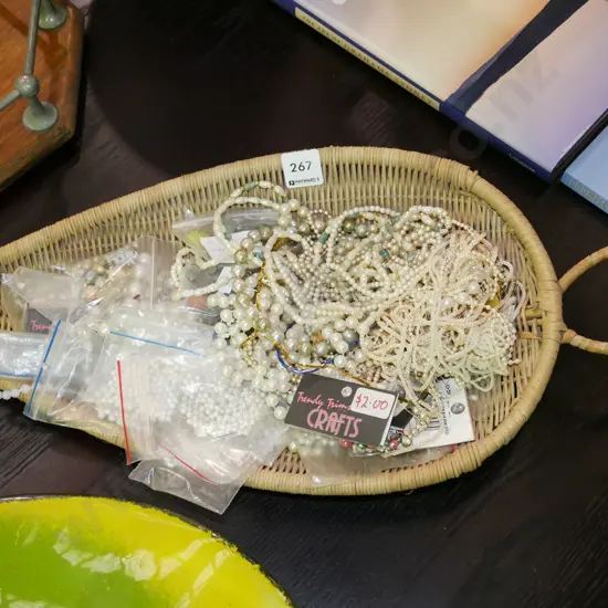 cane leaf dish with beads, necklaces etc