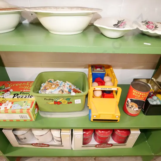 shelf of childrens puzzles and toys