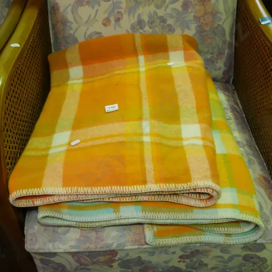 2x checked orange woollen blankets