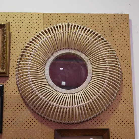 circular cane framed wall mirror 