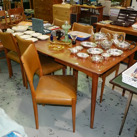 mid-century teak and mdf extending dining table with 6 matching brown vinyl chairs H-740 W-1840 D-910