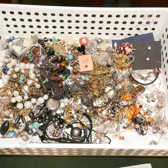 plastic tray of costume jewellery