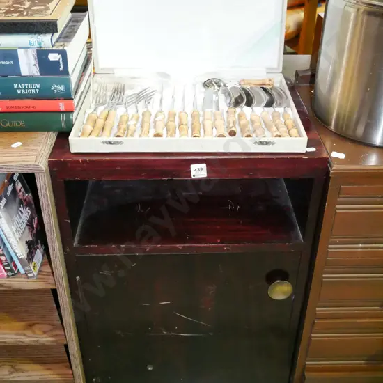 dark stained solid wood bedside cabinet