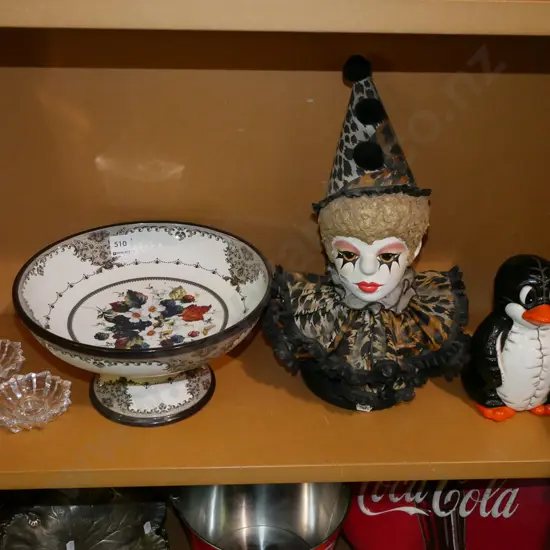 shelf; penguin figurines, clown figurine, large ceramic comport, candlesticks