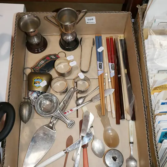 box; chopsticks, trophies, cow bell etc