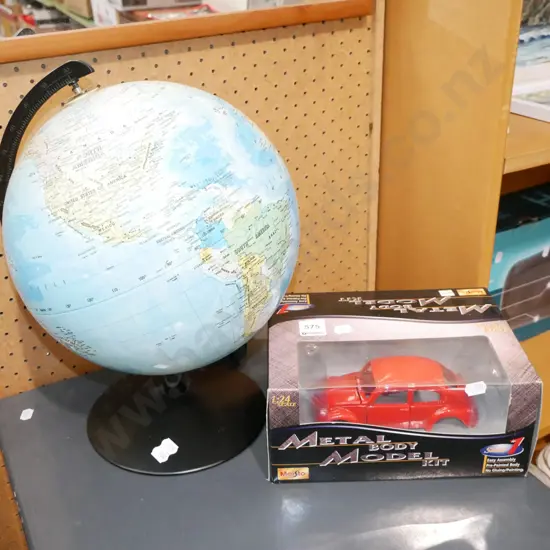 diecast 1:24 scale model of VW metal body, world globe