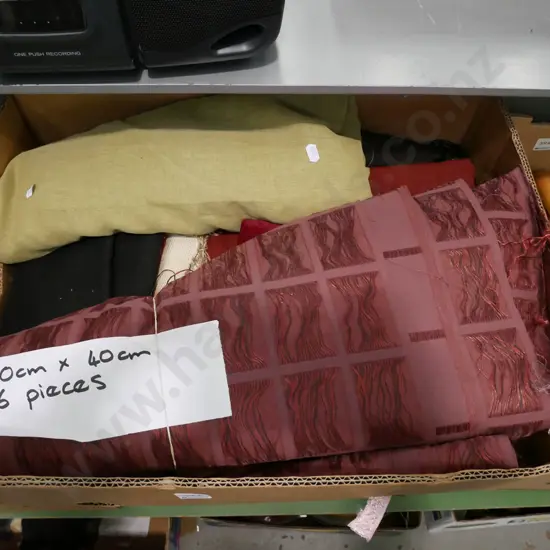 box of fabric pieces