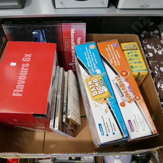 box; bath bomb kits, robotic ball machine, poetry books etc