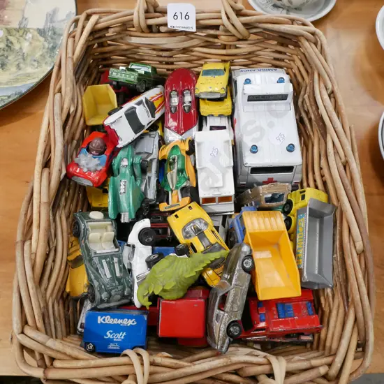 cane basket and toy vehicles