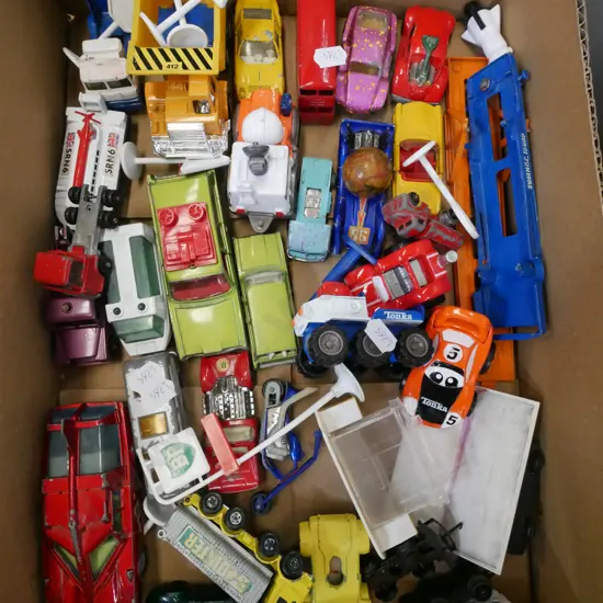 box of toy vehicles
